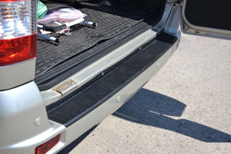 Накладка на задний бампер (черное тиснение) (ABS) UAZ PATRIOT 2014- PT Group