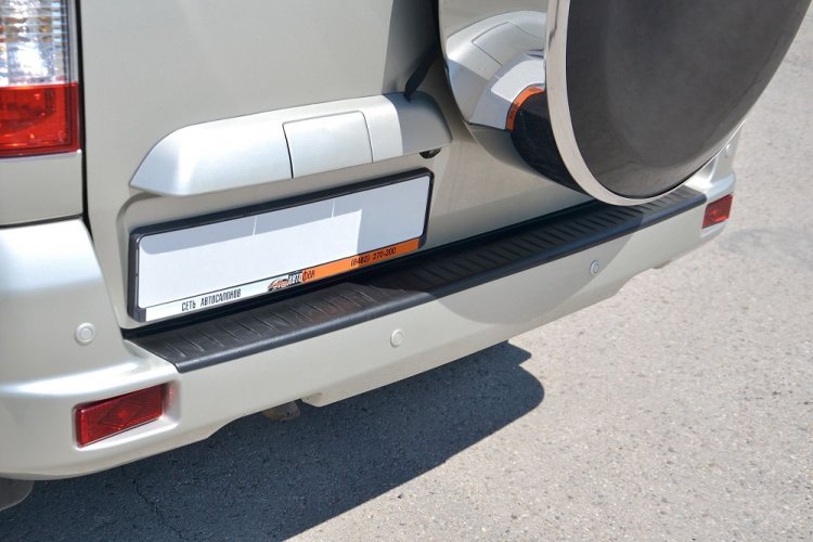 Накладка на задний бампер (черное тиснение) (ABS) UAZ PATRIOT 2014- PT Group